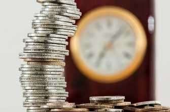 Selective Focus Photo of Stacked Coins