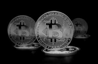 High contrast image of shiny Bitcoin coins symbolizing digital currency and finance.