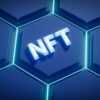 a blue hexagonal background with the word nft on it