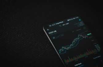 black android smartphone on black textile