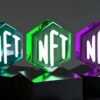 three glass blocks with different letters on them